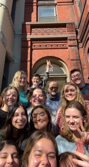 Group of NWU students in front of the townhouse they live in while in D.C.